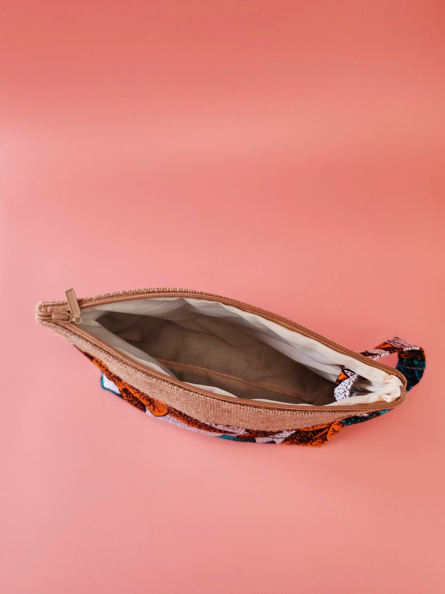 Pochette en toile de jute & wax Fleurs des îles – Avec dragonne