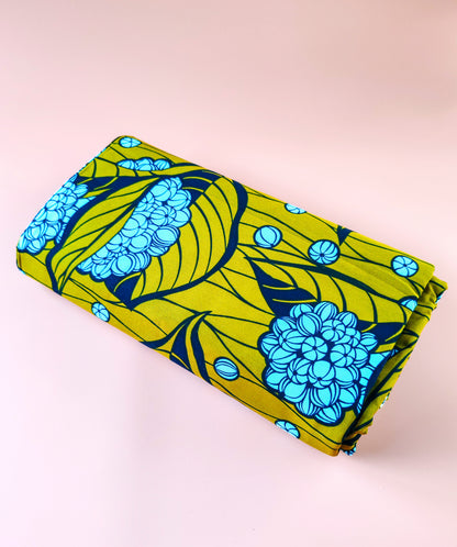 Tissu Wax “Molène” – L’élégance végétale aux nuances dorées