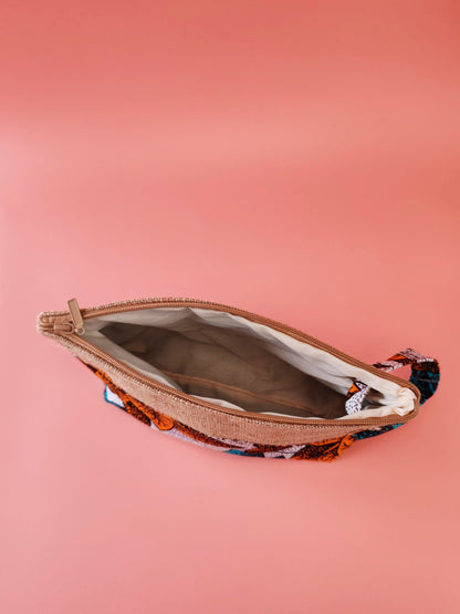 Pochette en toile de jute & wax Fleurs des îles – Avec dragonne